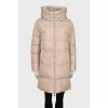 Beige down jacket with tag