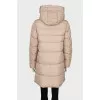 Beige down jacket with tag