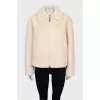 Short fur coat with a zipper