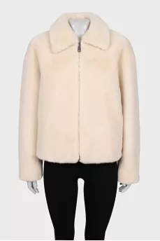 Short fur coat with a zipper
