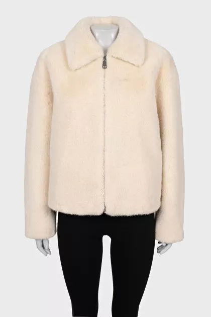 Short fur coat with a zipper