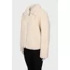 Short fur coat with a zipper