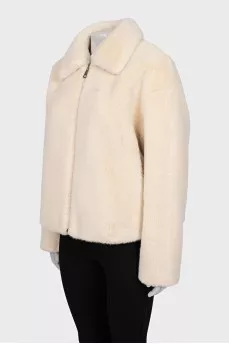 Short fur coat with a zipper