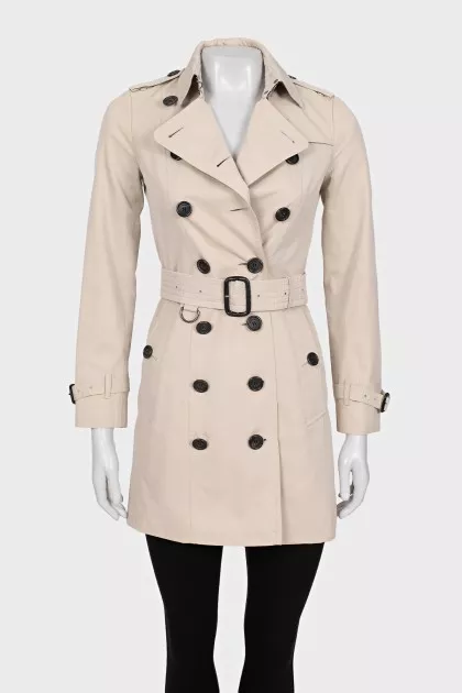 Beige double-breasted button-down trench coat