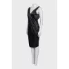 Black sheath dress with an open back