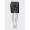 Leather mini skirt with buttons