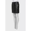 Leather mini skirt with buttons