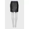Leather mini skirt with buttons