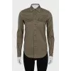 Button-down shirt with a ripped effect