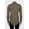 Button-down shirt with a ripped effect