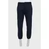 Men's tapered trousers with monogram