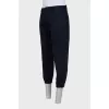 Men's tapered trousers with monogram