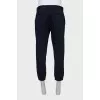 Men's tapered trousers with monogram
