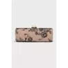 Leather clutch decorated with black lace