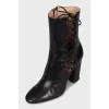 Black leather lace-up ankle boots