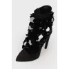 Ankle boots with large black sequins