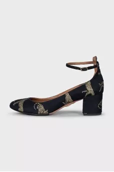 Textile shoes with a gold print