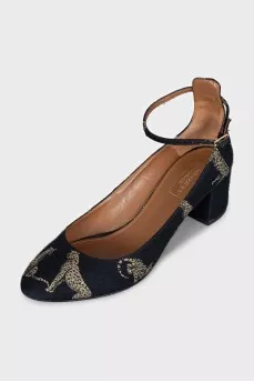 Textile shoes with a gold print