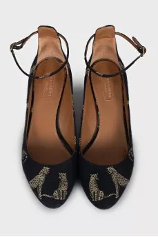 Textile shoes with a gold print
