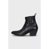 Black leather slip-on boots