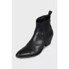 Black leather slip-on boots