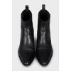 Black leather slip-on boots