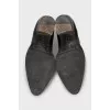 Black leather slip-on boots