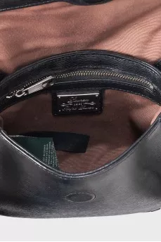 Textured leather bag with magnetic closure