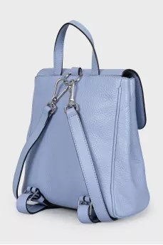 Blue backpack with a tag