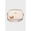 White leather bag with print