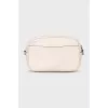 White leather bag with print