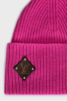 Pink hat with a brand logo