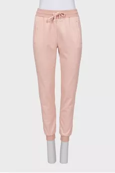Pink suit with signature monogram