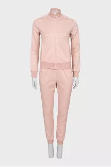 Pink suit with signature monogram