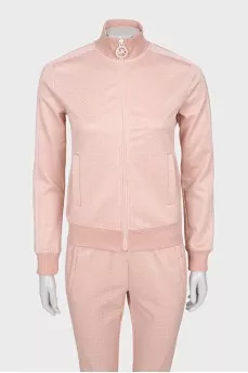 Pink suit with signature monogram