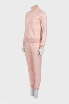 Pink suit with signature monogram