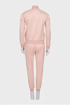 Pink suit with signature monogram