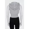 Fitted vest with hood