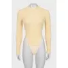 Knitted yellow bodysuit