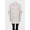 Oversized jumper with gold thread