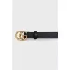 Narrow leather belt with a gold buckle