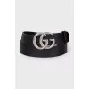 Men's leather belt with a signature buckle