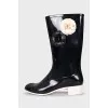 Black rubber boots decorated with flowers