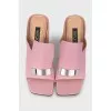 Pink mules with a shaped heel