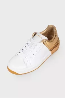 Golden heel sneakers