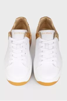 Golden heel sneakers