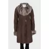 Sheepskin coat with buttons and a voluminous collar