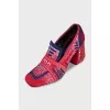 Textile shoes with a figured heel