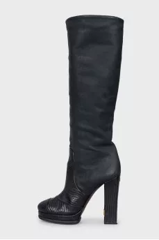 Leather boots with a relief pattern