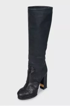 Leather boots with a relief pattern